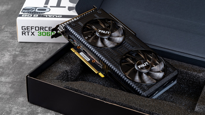 Palit GeForce RTX 3060 graphics card shown inside its box.