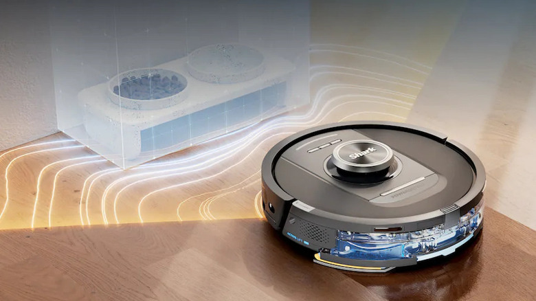 The Shark RV2820YE detecting a bowl of pet's food-and-water tray.