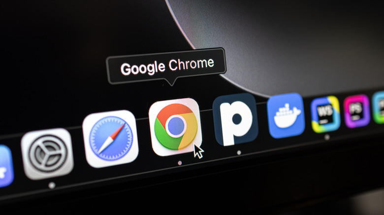 A mouse cursor on macOS hovering over Google Chrome.