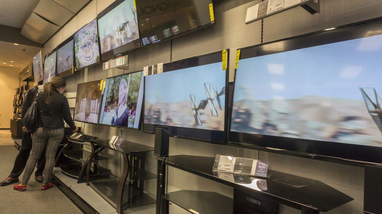 Customers browsing Samsung TVs at Best Buy