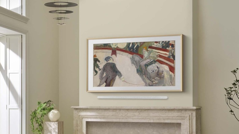 The Frame Pro 4K Samsung TV in living room displaying painting