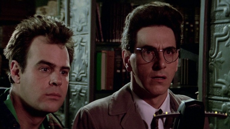 Dr. Raymond Stantz standing beside Egon Spangler, using a P.K.E meter.