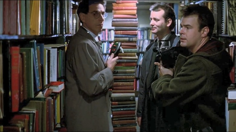 Egon, Venkman, and Ray investigating a haunted library in Ghostbusters
