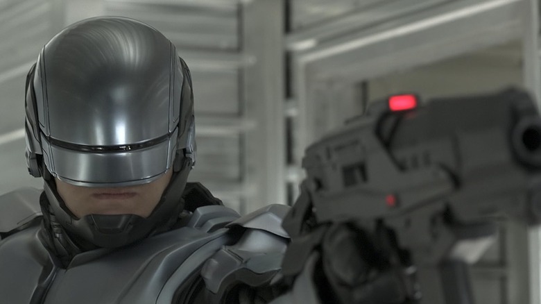 Robocop aiming a gun