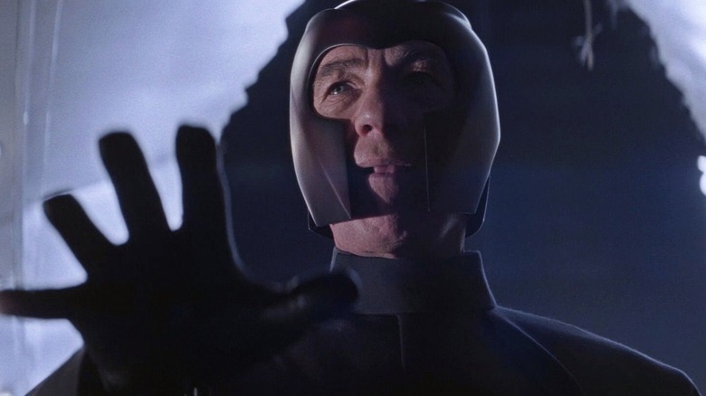 Ian McKellen as Magneto holding out his hand in X-Men