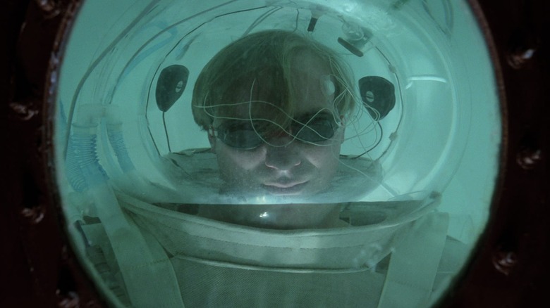 Eddie in a suit in a sensory deprivation tank in "Altered States."