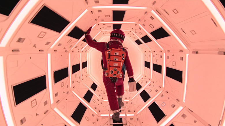 Dave Bowman walking through the Discovery One spacecraft corridor in 2001: A Space Odyssey (1968).
