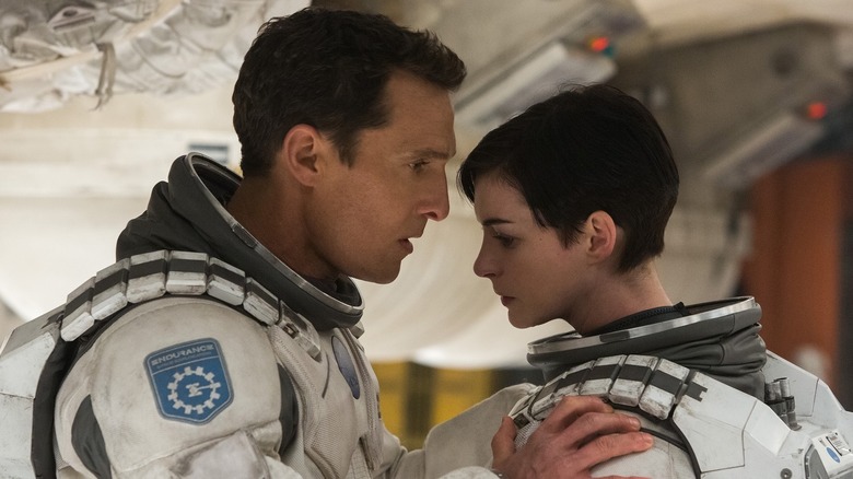 Cooper (Matthew McConaughey) talking to Brand (Anne Hathaway) in Interstellar