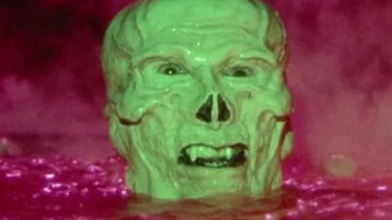 Skeletor coming out from water in Masters of the Universe (1987)