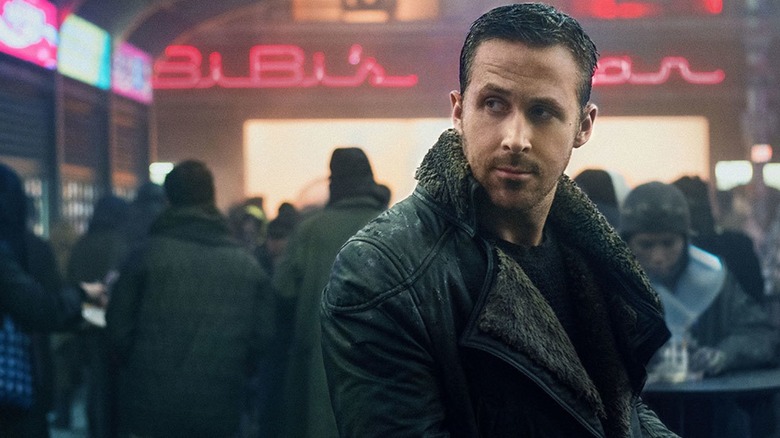 K standing at a bar in Blade Runner 2049