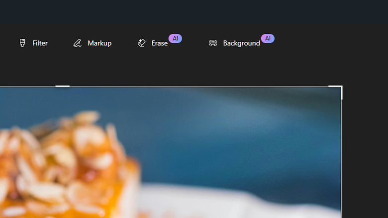 Erase and Background tools displayed in Photos app within Windows 11