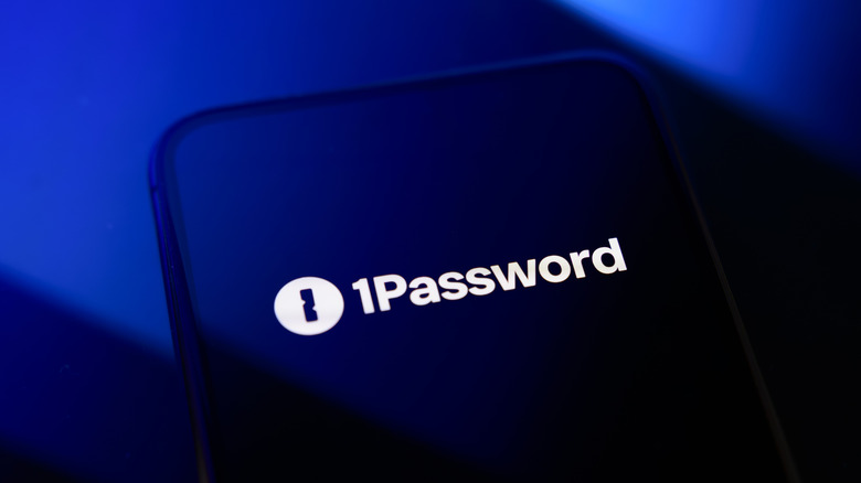 1Password logo displayed on a phone