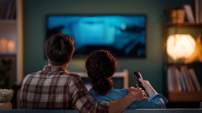 A couple watching tv