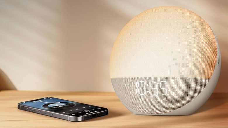 The Odokee sunrise alarm clock on a nightstand.
