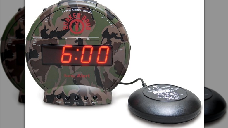 The Sonic Bomb alarm clock and its shaker module.