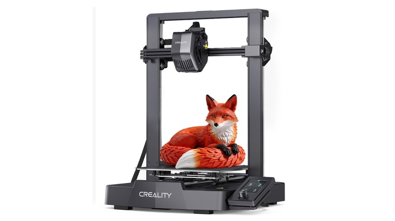 Creality Ender-3 V3 SE printing an orange fox model.