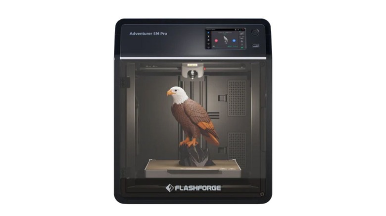 Flashforge Adventurer 5M Pro 3D printer with a bird model inside.
