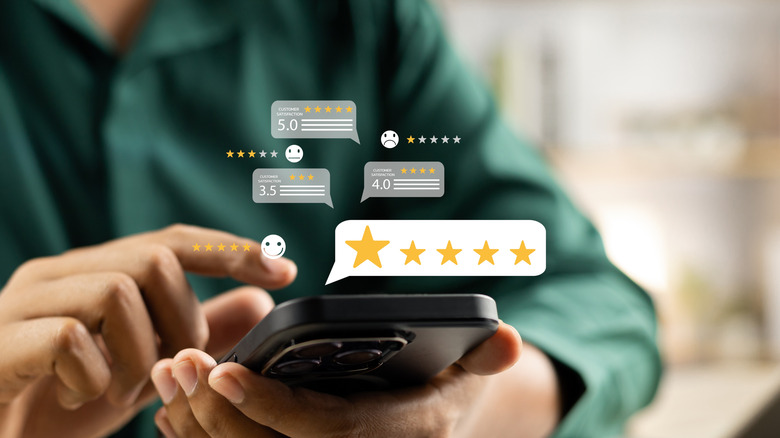 graphics of user ratings with a man using his phone in the backdrop