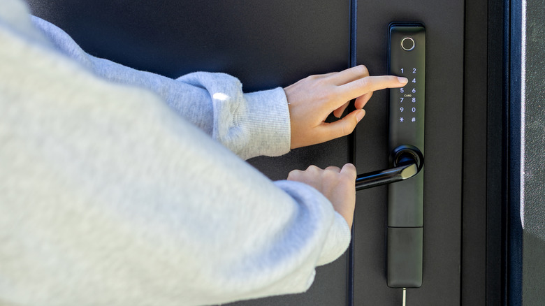 Person navigating a smart door lock