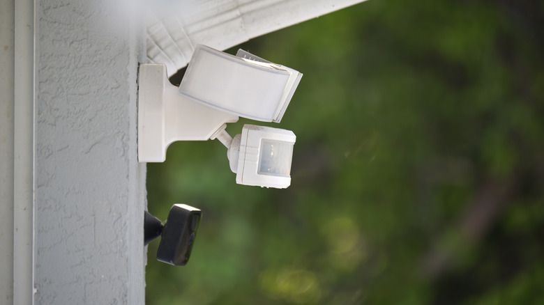 Motion sensors attached to a wall outside