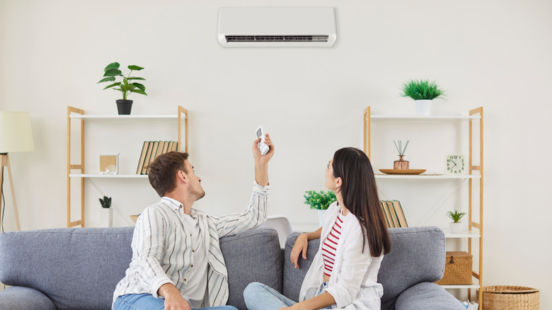 Couple setting up AC