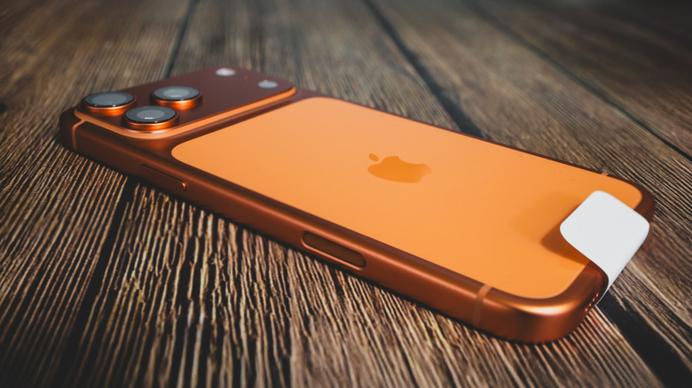 The iPhone 17 Pro Max face down on a table, after being taken out of the retail box.