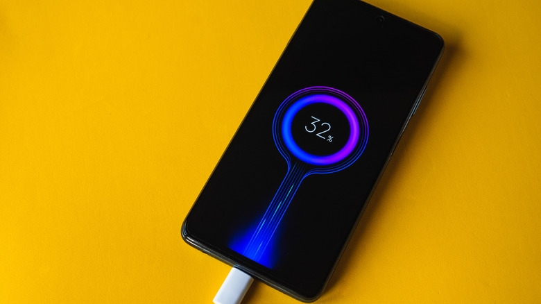 A smartphone displaying its charging animation