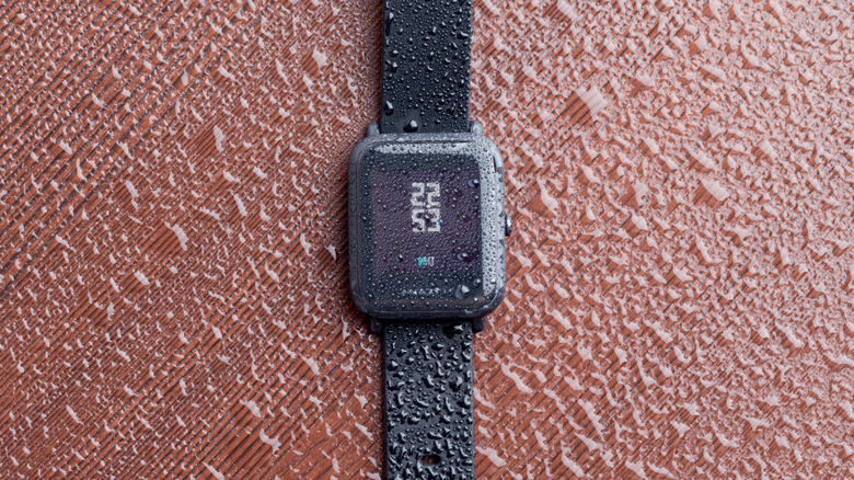 An Amazfit smartwatch in the rain