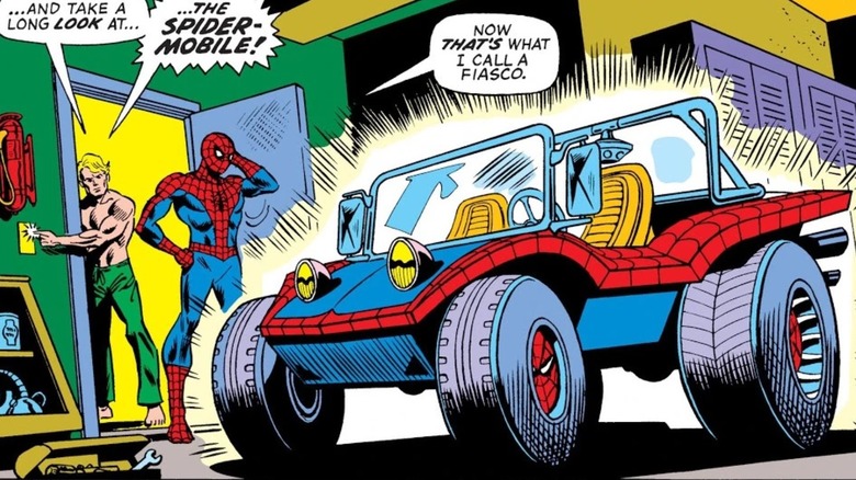 Spider-Man looking at the Spider-Mobile