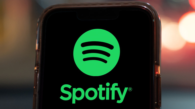 A picture of the Spotify logo on a phone screen