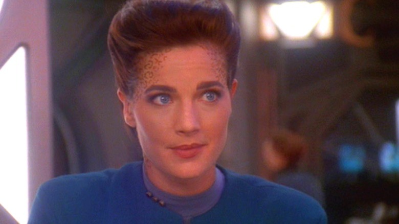Jazia Dax staring at somebody off screen in Deep Space 9