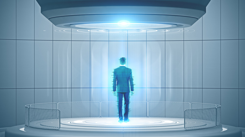 Concept art of a holodeck featuring a blue holographic display of a male figure from behind standing on a platform