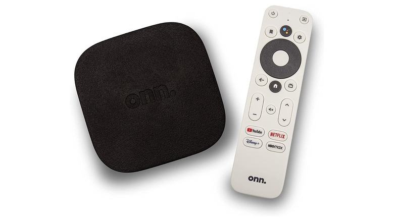 Onn 4K Plus streaming device with remote in front of white background