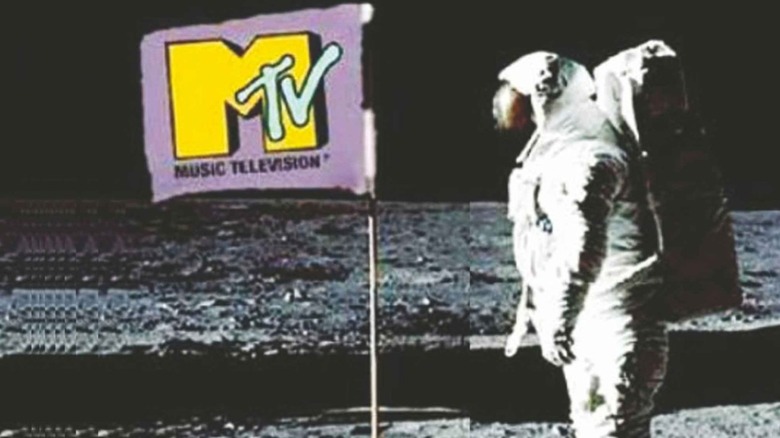 Retro MTV commercial banner featuring astronaut and flag with MTV logo