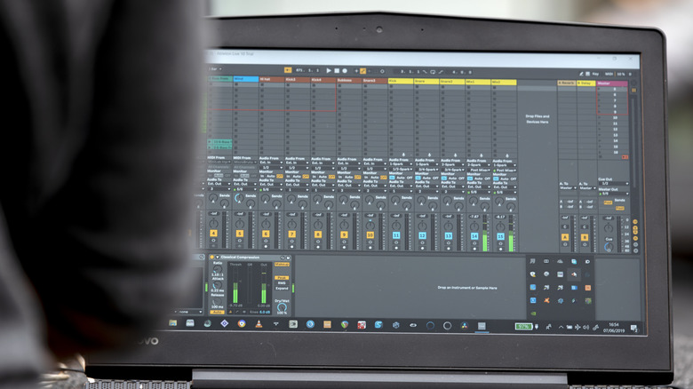 A closeup of a computer showing the mixing screen on Ableton Live