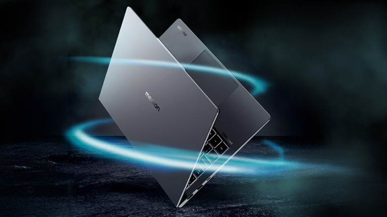 Medion laptop with a blue swirl around it
