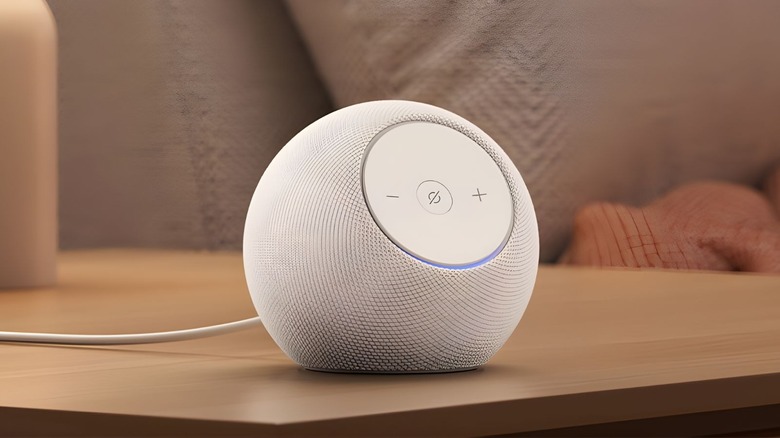 Echo Dot Max in white on a tabletop in a living room environment.