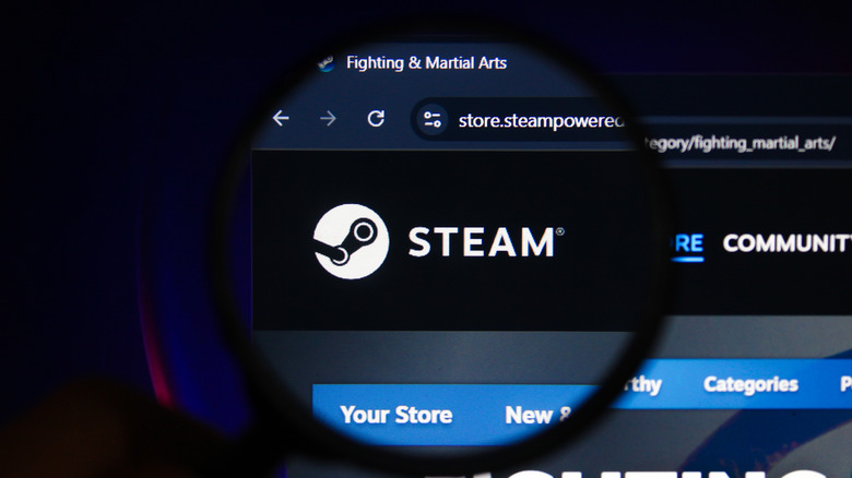 A magnifying glass zooming in on the Steam icon on the Steam website