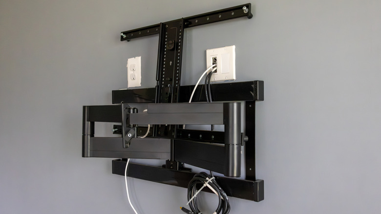 A TV mount installed in a wall.