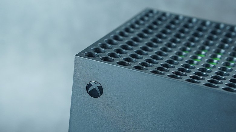An Xbox Series X console highlighting the power button