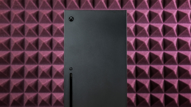 Xbox Series X console on purple background