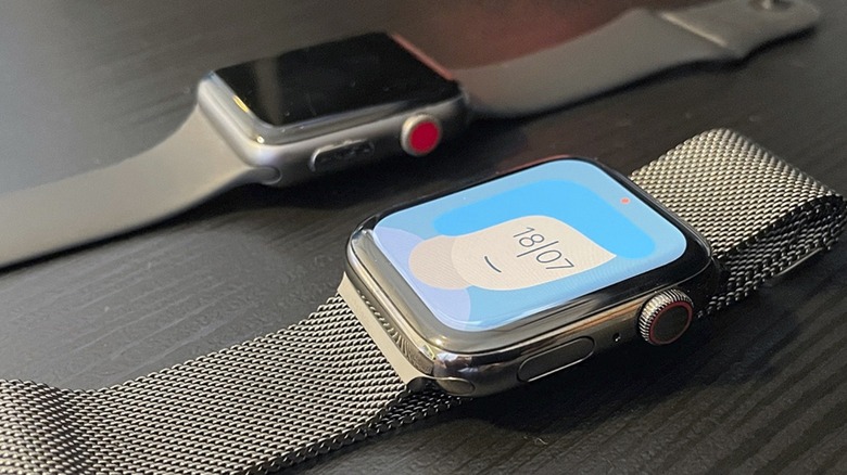 Close-up shot of an Apple Watch Series 6 and an Apple Watch Series 3 behind it