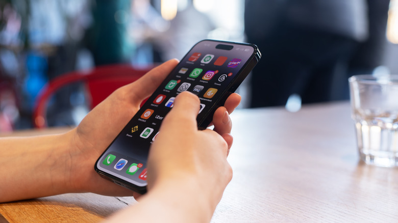 A person using an iPhone.