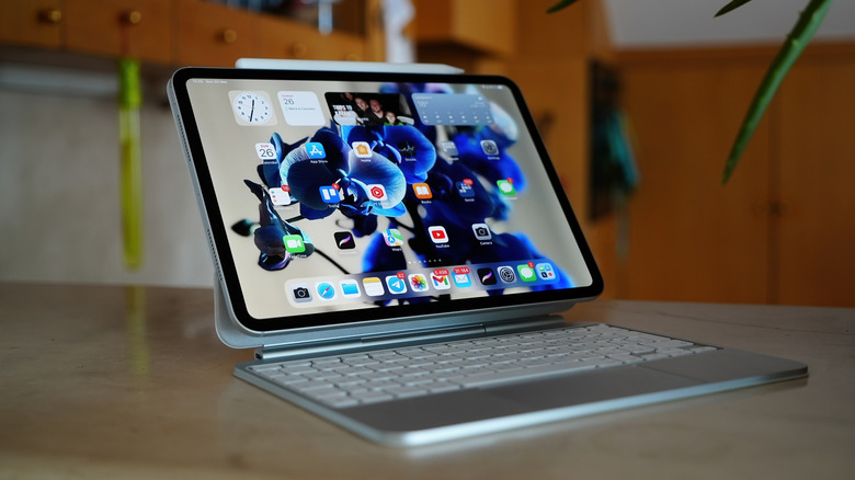 The M4 iPad Pro with Magic Keyboard and Apple Pencil accessories.