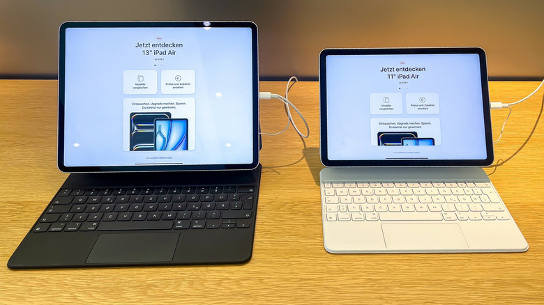 iPad Air models with Magic Keyboard attached.