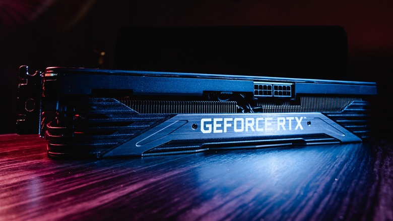 An Nvidia GeForce RTX 3070Ti on a tabletop lit by RGB lighting