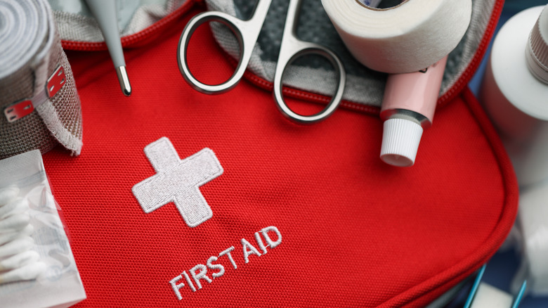 image showing medical equipment on top of a first aid kit