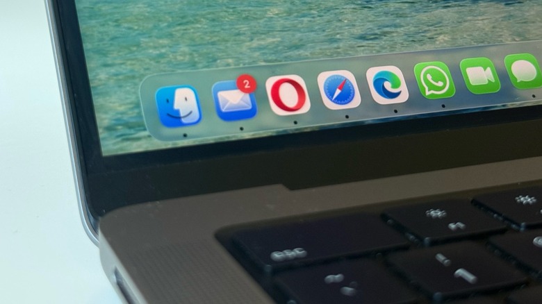 A close-up shot of macOS app icons on a MacBook Pro
