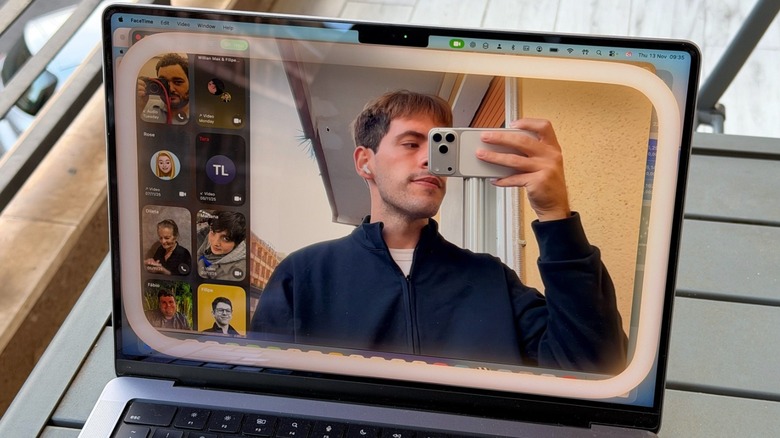 A man being recorded on the MacBook webcam
