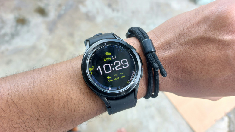 A Samsung Galaxy Watch showing the current time and weather